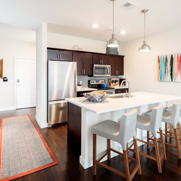Kitchen with high-end finishes and decor.