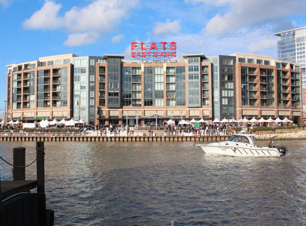 View from the river showing the entire exterior of the Flats building.