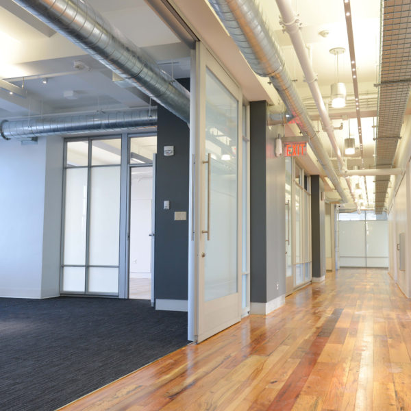 Hallway with rooms to the left