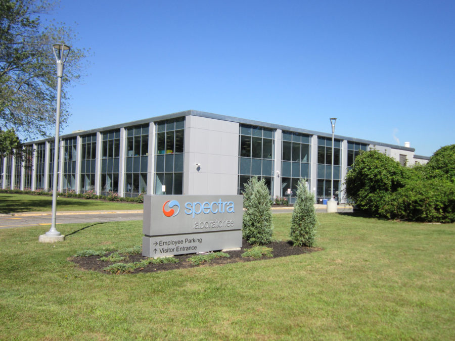 Exterior of building and Spectra Labs sign