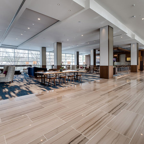 Lobby with seating area and bar at the far end