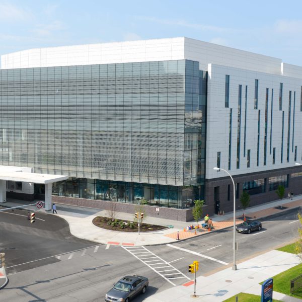 Exterior of building with large glass window facade