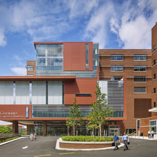 Brick and glass hospital building exterior.