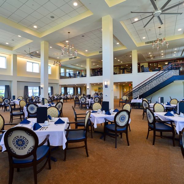 Dining room with set tables and chairs