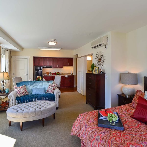 Resident bedroom with bed and furniture