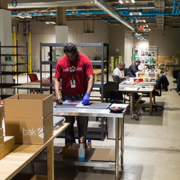 Warehouse space with workers.