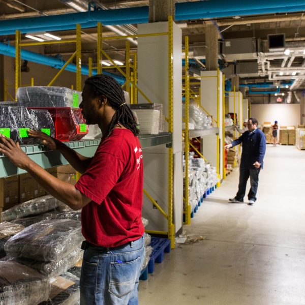 Warehouse space with workers.