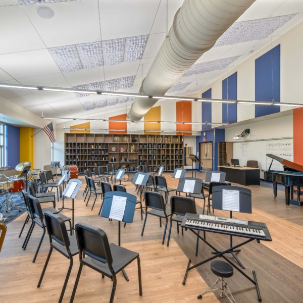 Music room with chairs, music stands and instruments