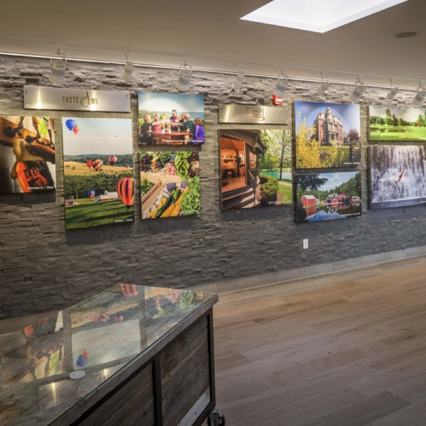 Wall with photos of NY farm products