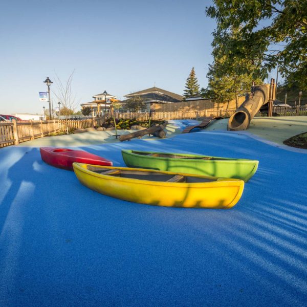 Exterior play area with canoes