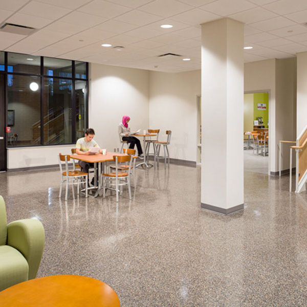 Work area for students with tables and chairs