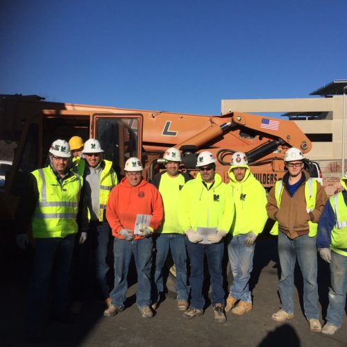 Group of men on construction site.