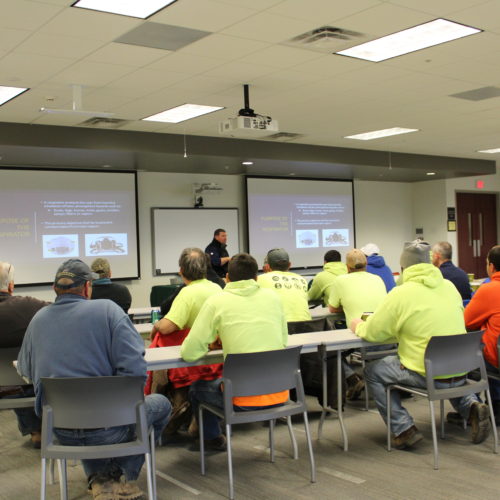 Group of people in training class.