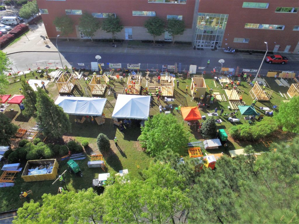 Aerial shot of sheds in construction.