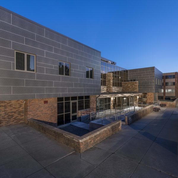 Dusk exterior of dormitory building.