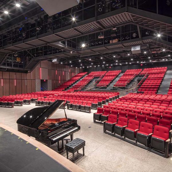 View from stage of piano and auditorium seats