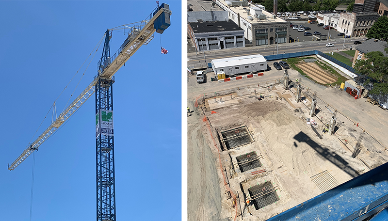 A tower crane (left) over the 300 Main site (right) in downtown Durham displays LeChase signage 