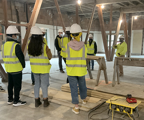 Students tour the campus project