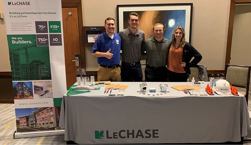 LeChase employees ready to meet construction students at the ASC event