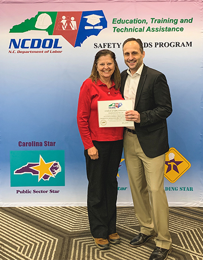 receiving NCDOL certificate for Charlotte Mecklenburg project