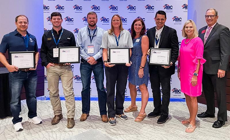 LeChase's Brooke Hathaway (fourth from left) receives the company's annual STEP award from the ABC Carolinas