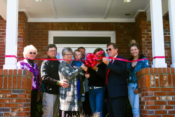 Mission team cutting the ribbon