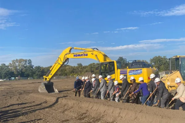 team breaking ground