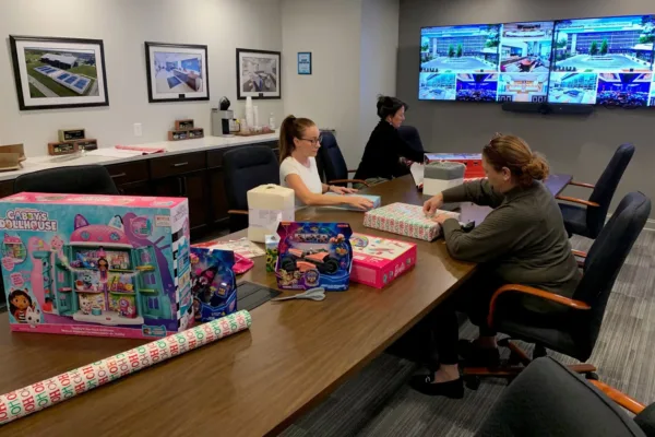 Buffalo team wrapping gifts