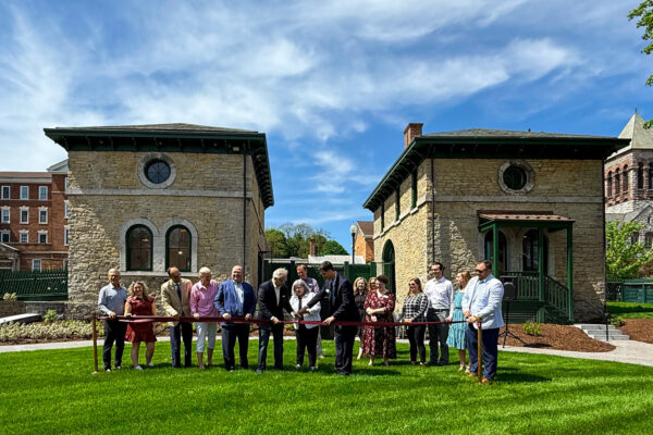 Team cutting the ribbon at the Seward House