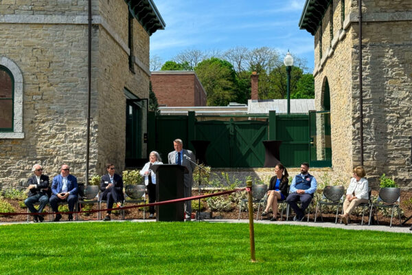 Lee speaking at the Seward House Ribbon Cutting