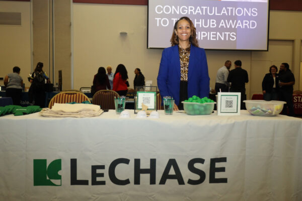 Denise at the LeChase table at the NC State Construction Conference expo