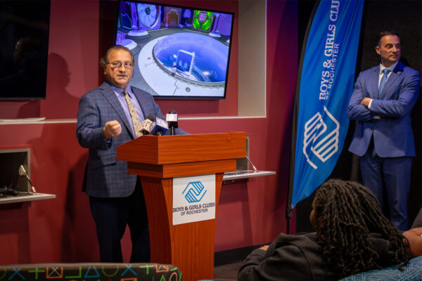 Raymond LeChase speaking at the ribbon cutting