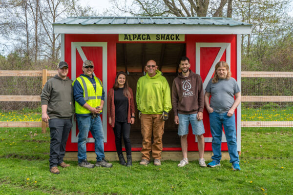 Team making the ACE Playhouse Delivery
