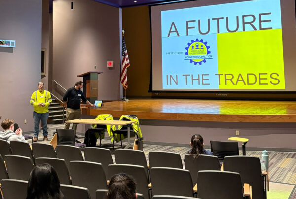 Evan and Vincent speaking with students at the NCTWC event
