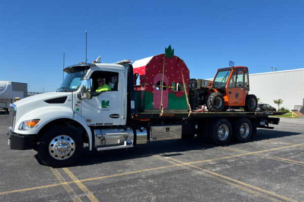 Rochester warehouse team delivering an ACE playhouse