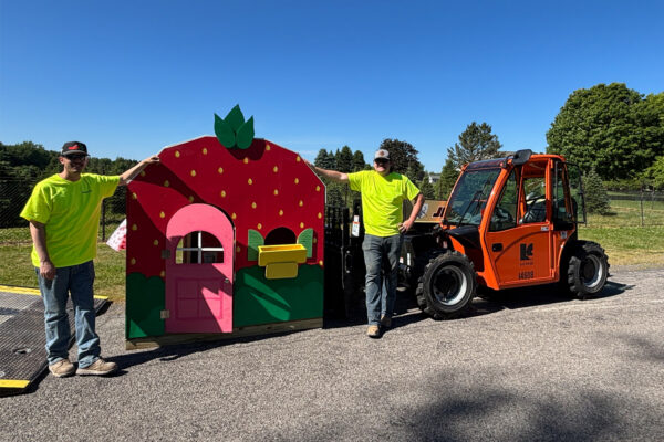 Rochester warehouse team delivering an ACE playhouse