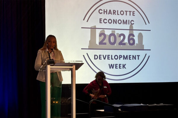 Denise presenting at Charlotte Development Week awards luncheon